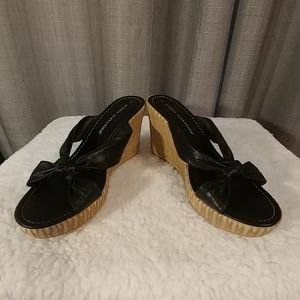 Black leather wedges